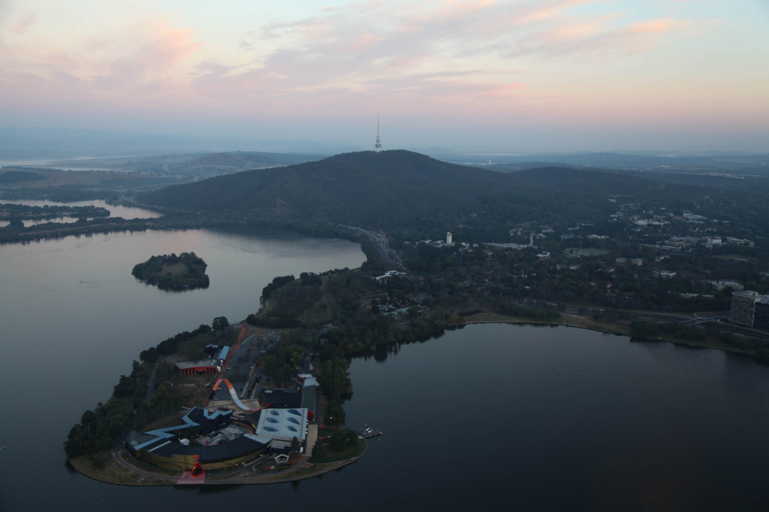 Aerial view of lake burley griffin and Black Mountain in Canberra