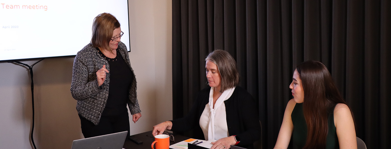 Staff members in a meeting